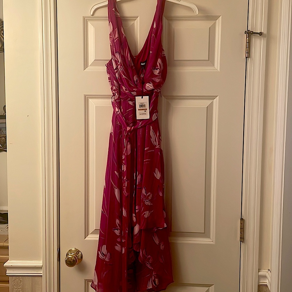 Never worn DKNY flirty purple dress size 12. Original price $129 tag still on.